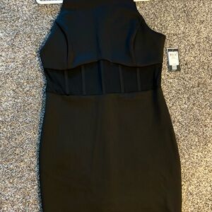 Guess Jeans- Elegant Black Sleeveless Dress with mesh midsection.